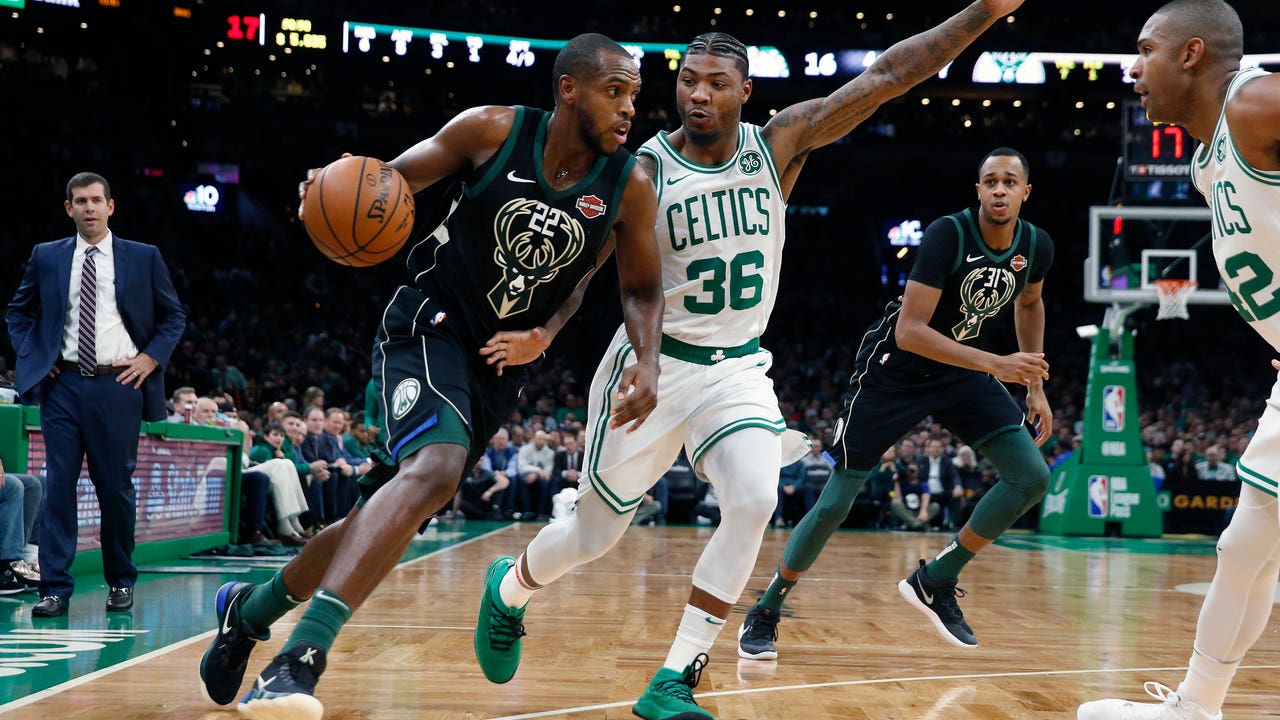 Irving scores 28, Celtics beat Bucks 117-113